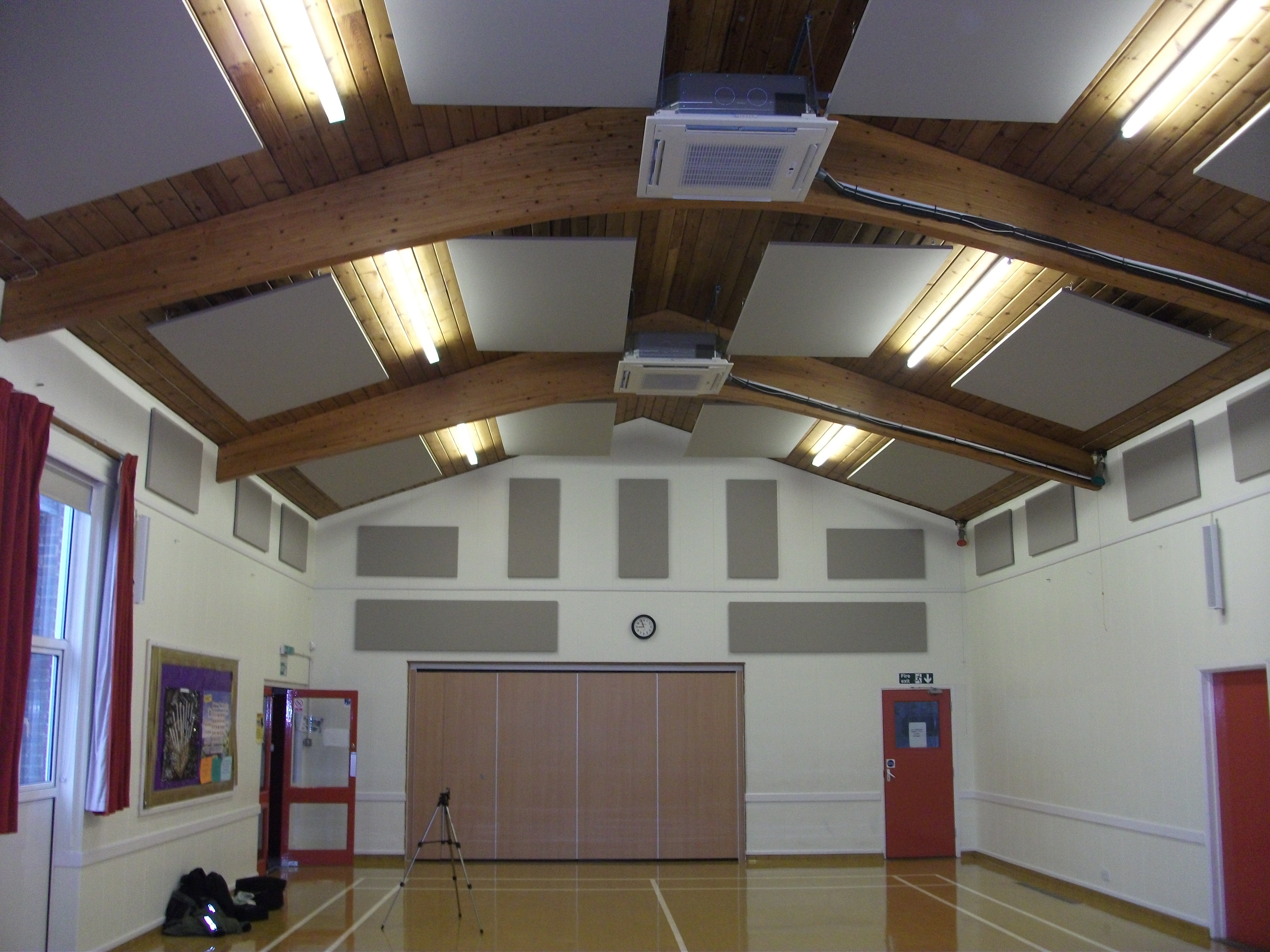 Wall and ceiling acoustic panels installed in a local village hall