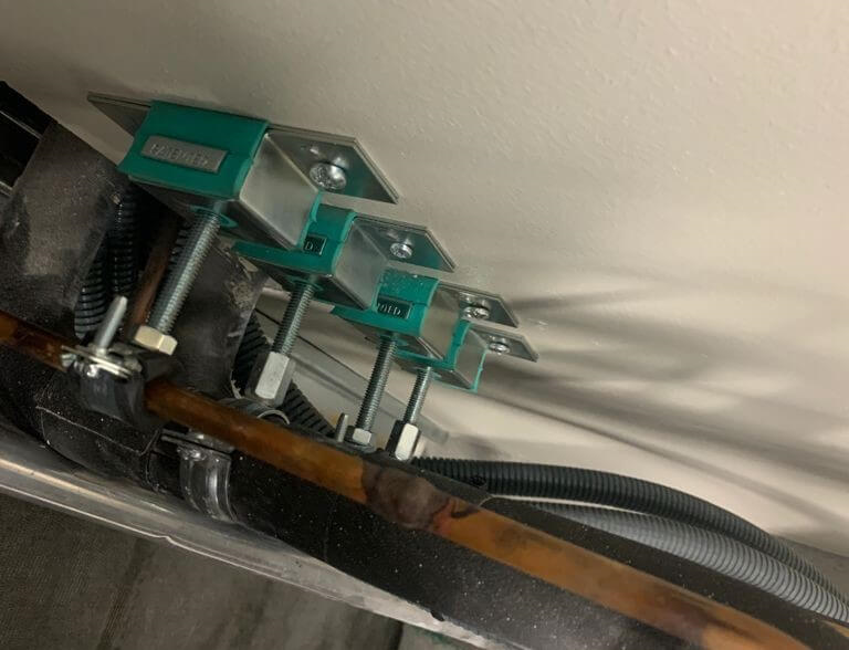 acoustic pipe clamp support installed