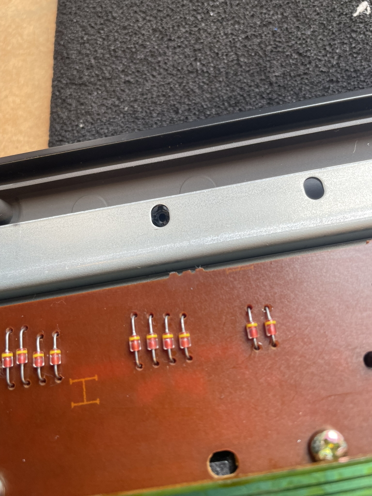 dx100 key contact plastic supports broken in situ