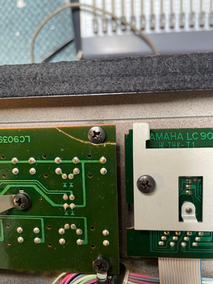 DX7 broken PCB corner